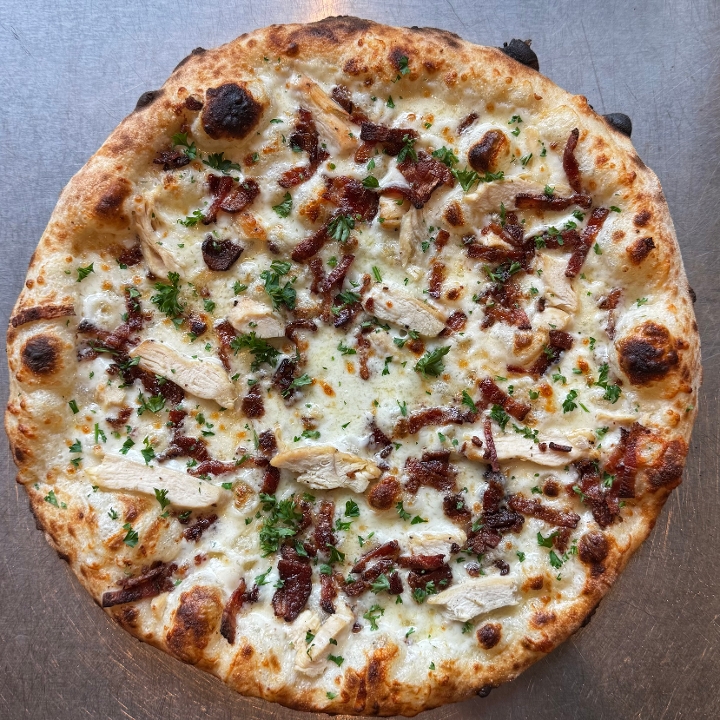 Night Moves Pizza | Round.