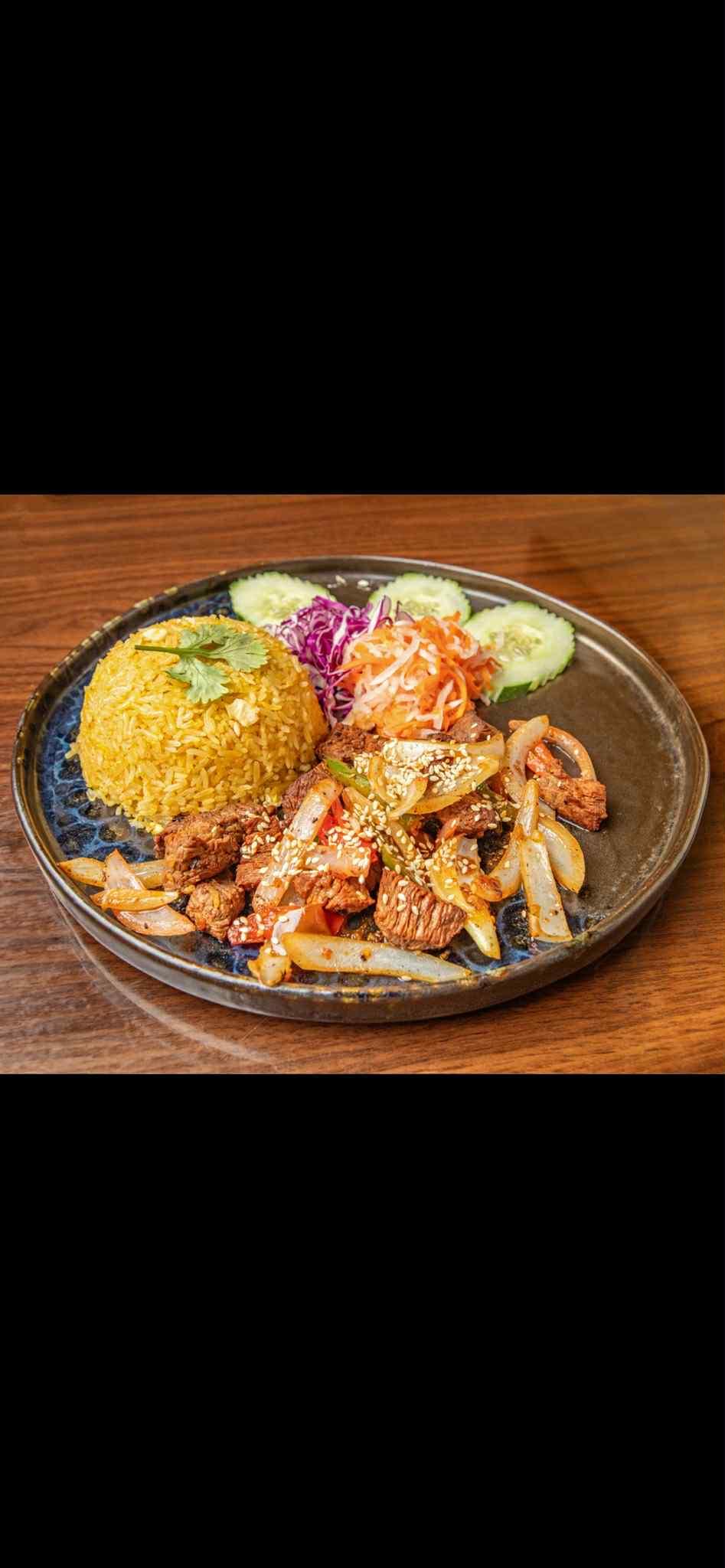 Shaken Beef Filet Mignon Rice Dish.