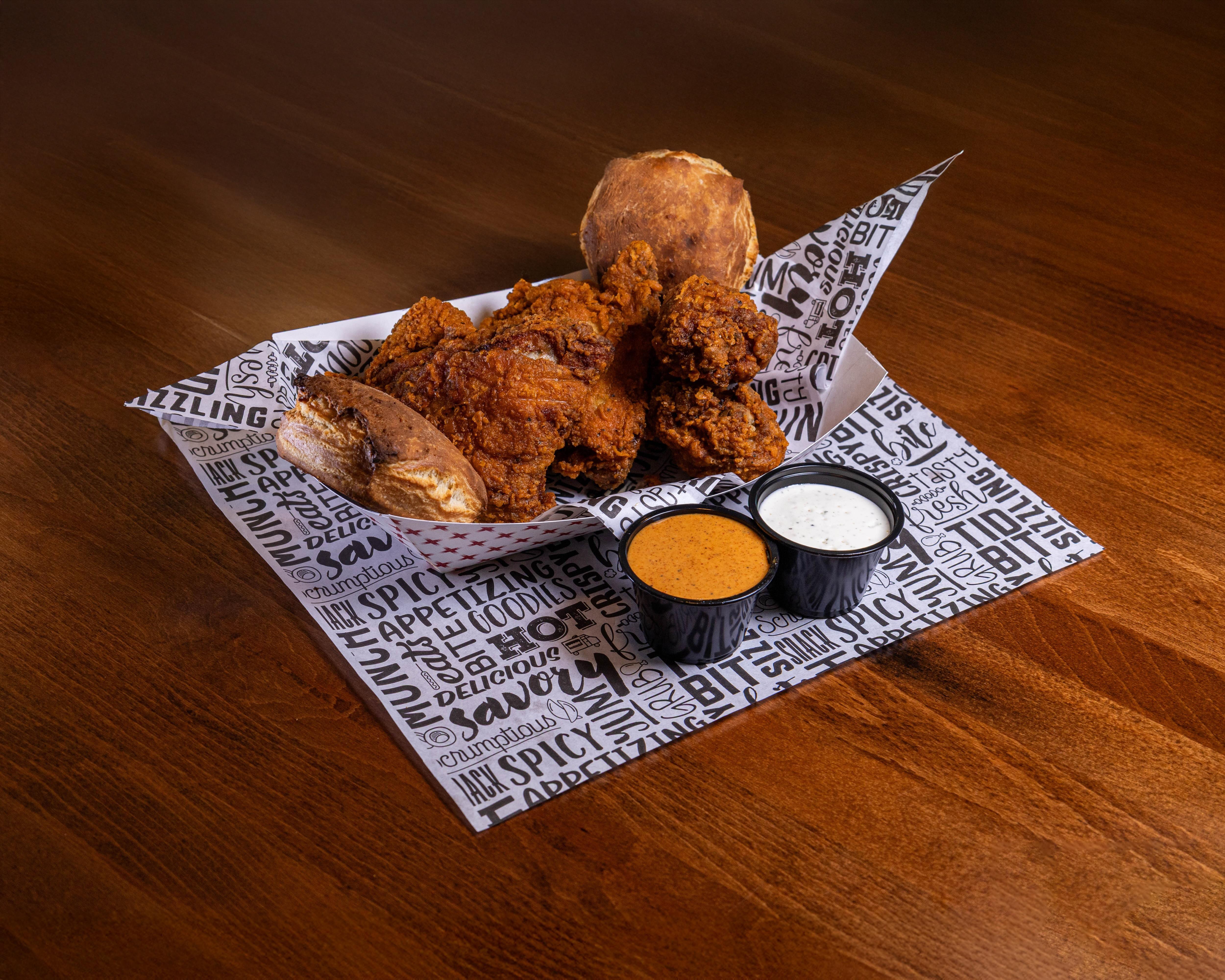 4 Pieces (Bone-In), 2 Sauces, 2 Rustic Butter Biscuits.