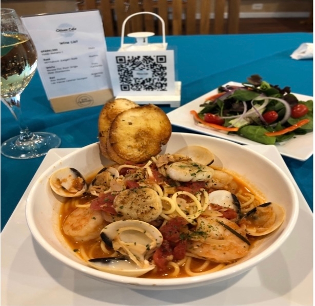 Seafood Pasta with Scallops, Shrimp, Clams over Fettuccine.