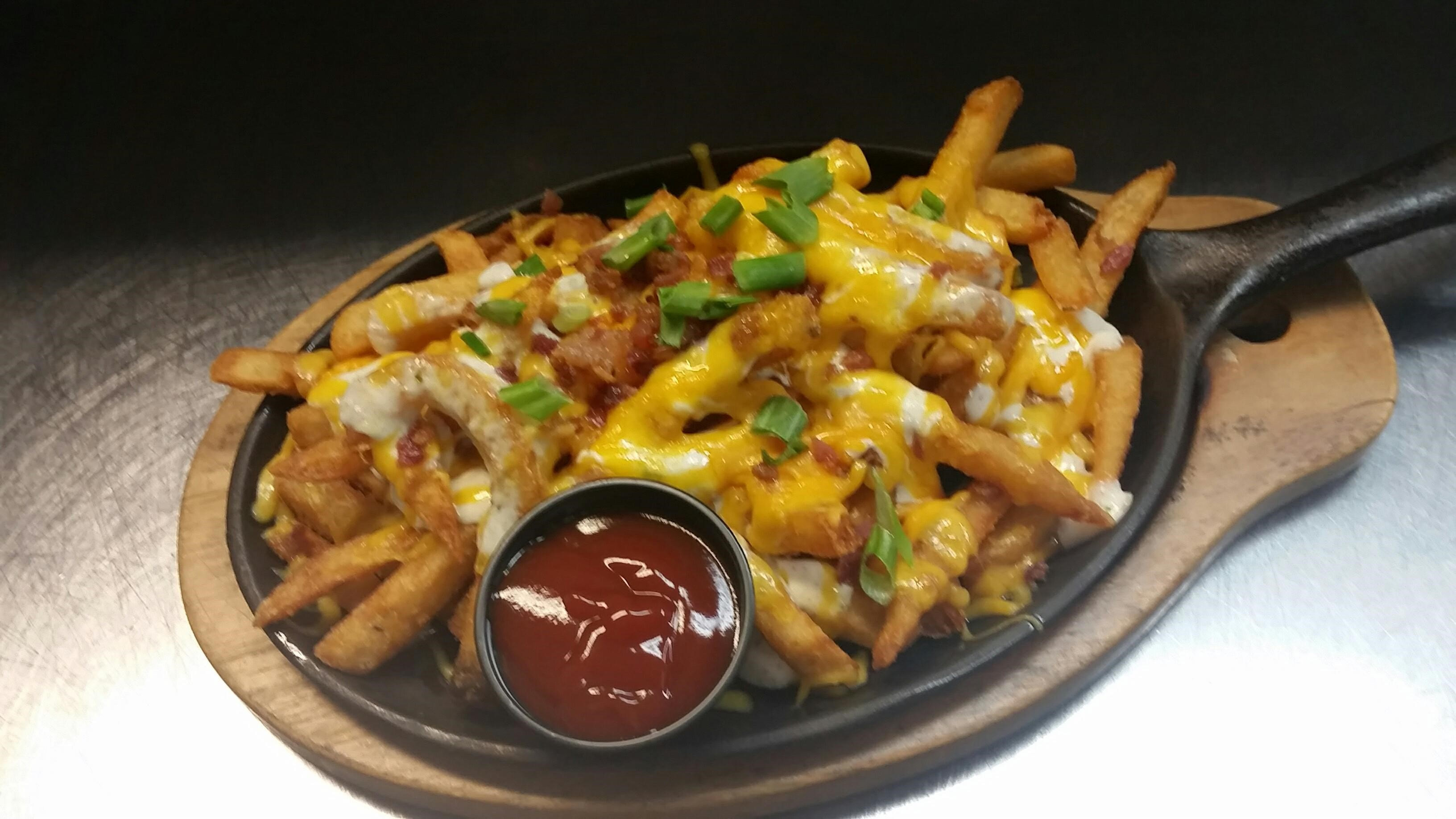 LOADED CHEDDAR FRIES.