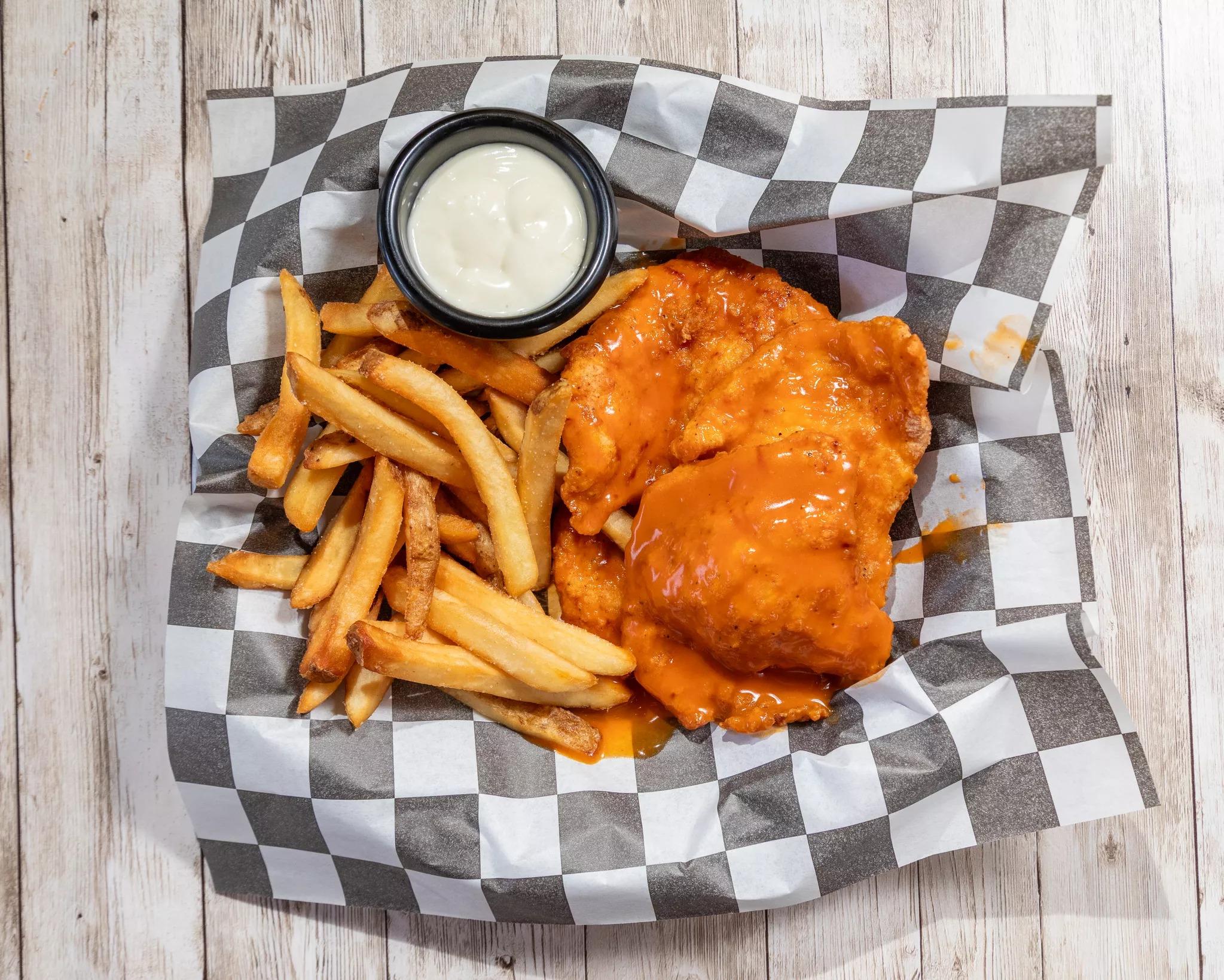 Buffalo Chicken Fingers with Fries.