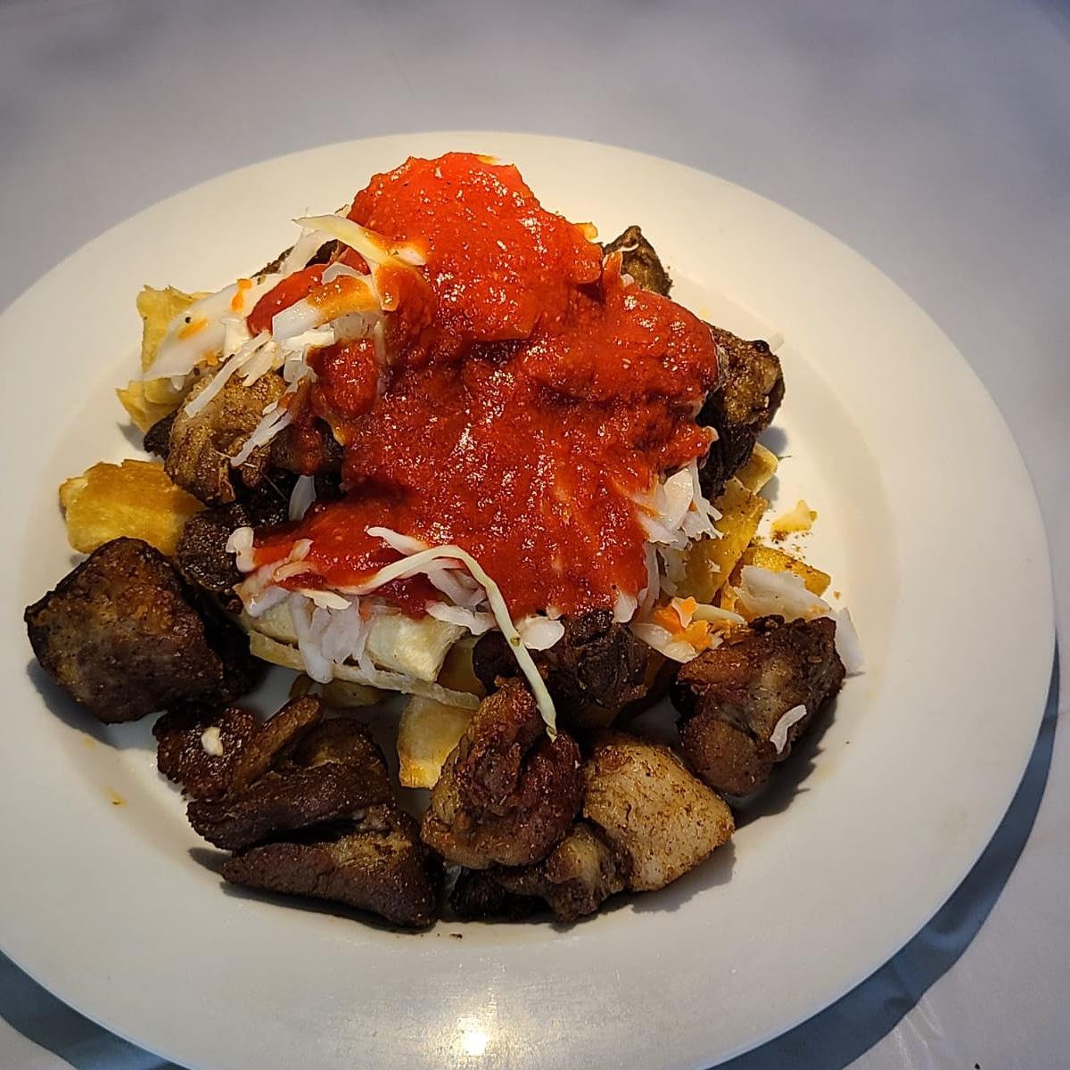 Yuca Con Chicharrón.
