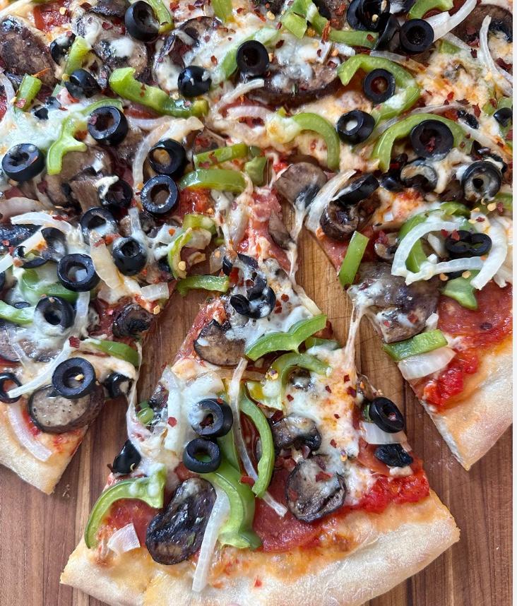 SUPREME PIZZA SLICE.