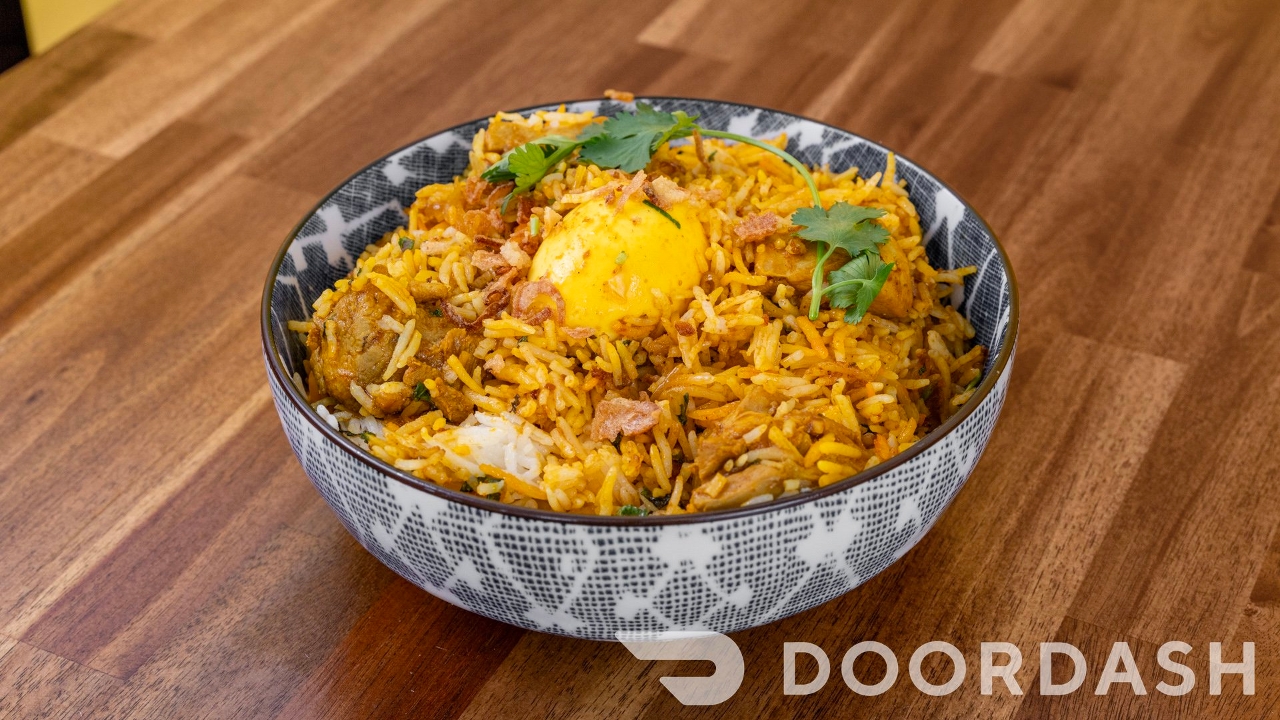 Awadhi Chicken Dum Biryani.