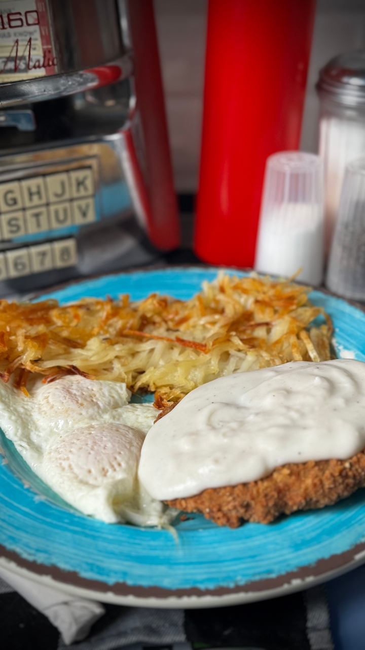 Country Fried Steak With Eggs*.