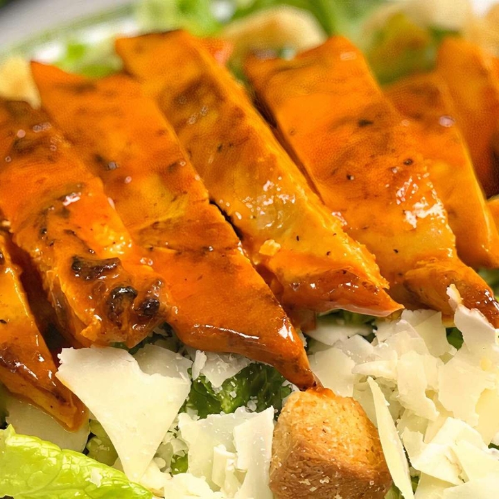 Caesar Salad with Grilled Buffalo Chicken.
