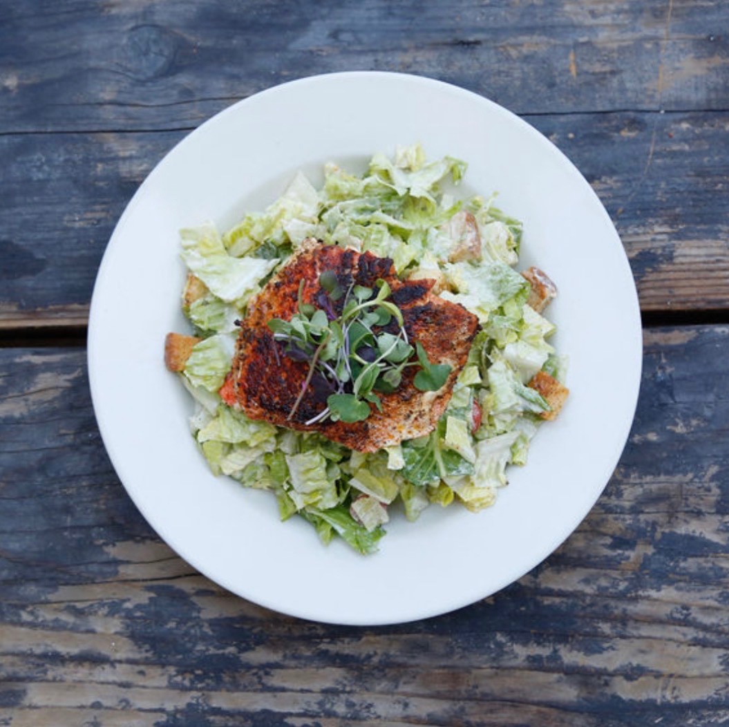 Wild Alaskan Salmon Caesar Salad.