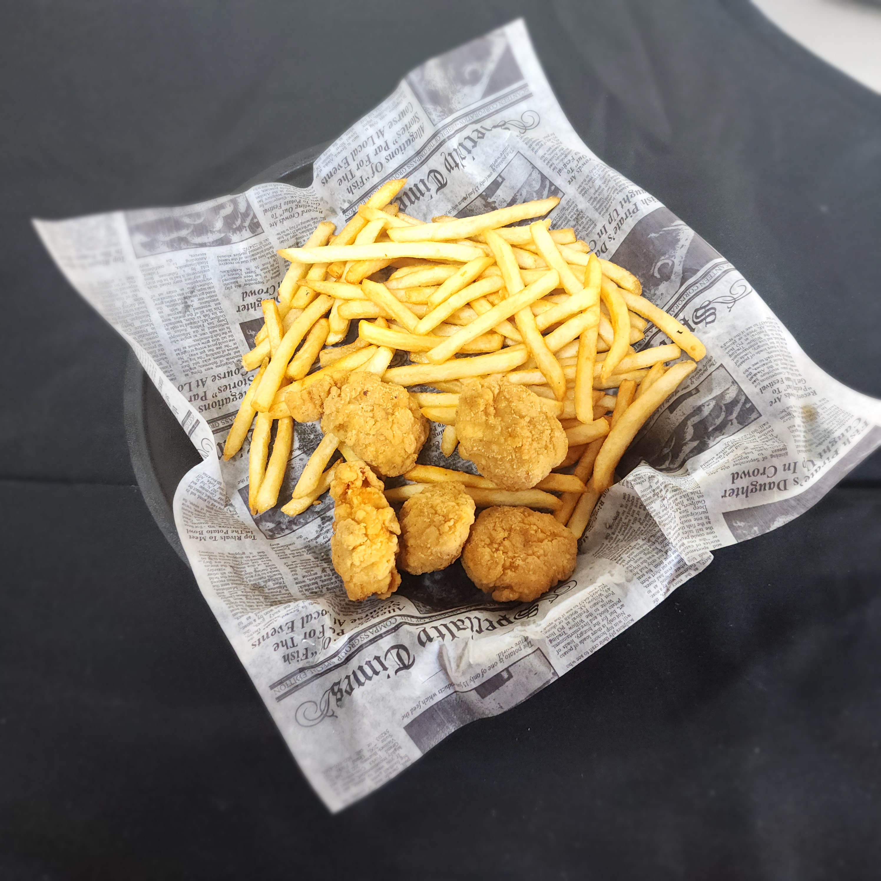 Chicken Nuggets with Fries.