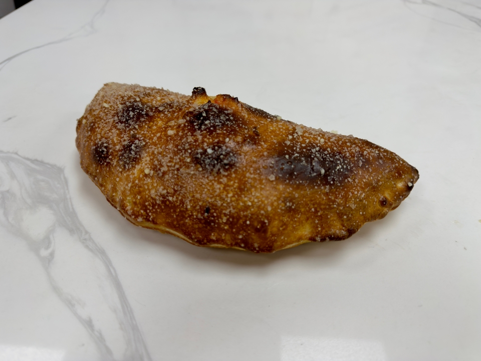 Calzone With Cheese and Sauce.