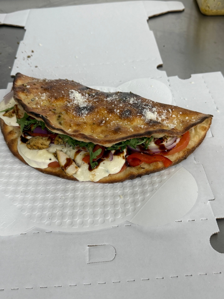 Ari'a Special Pizza Sandwich.