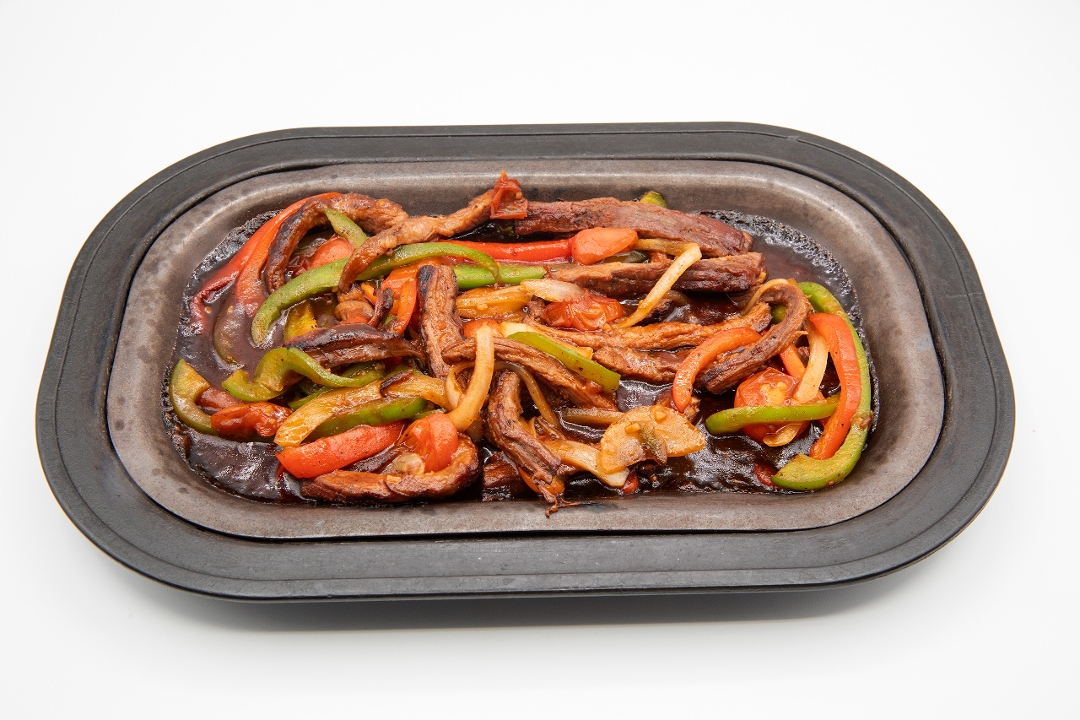 Sizzling Black Pepper Steak.
