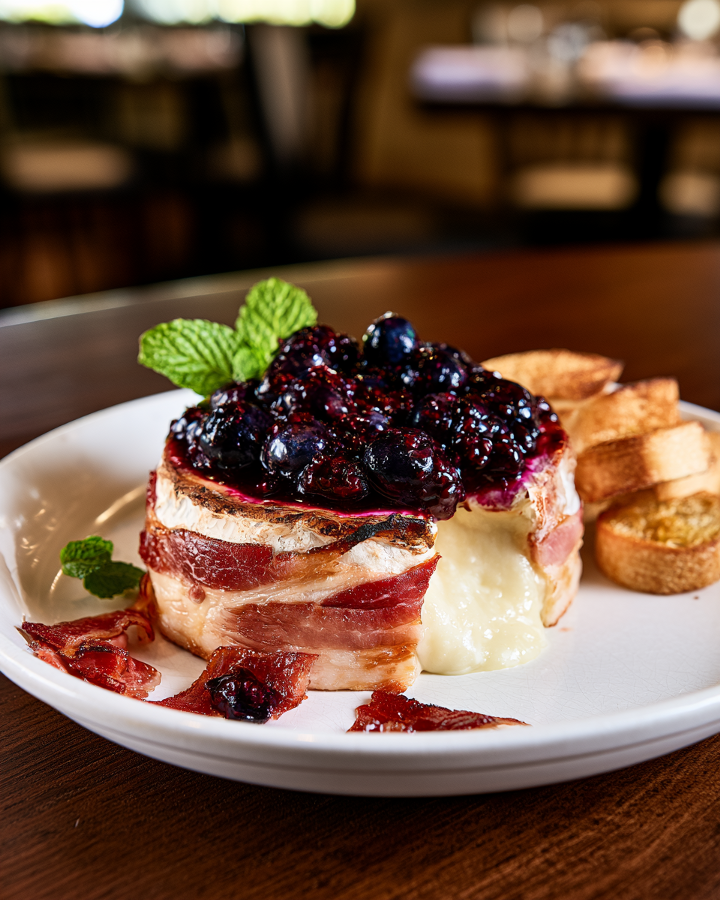 Pancetta-Wrapped Baked Brie with Berry Jam.