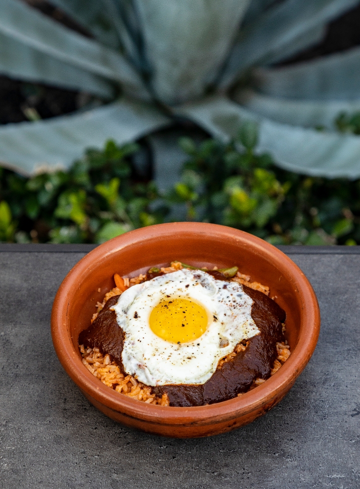 Arroz Con Mole Topped with a Fried Egg.