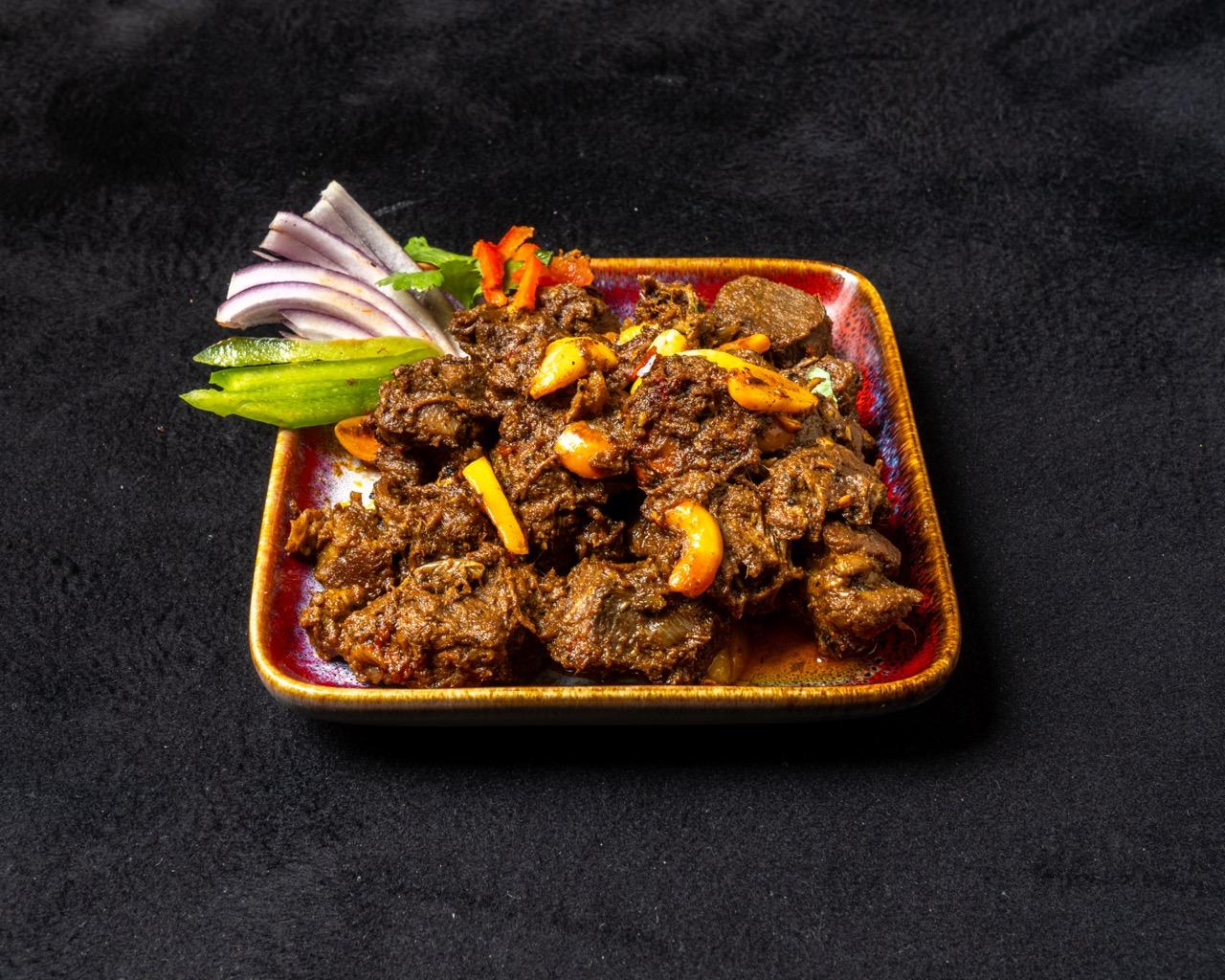 Madurai Mutton Sukka (Boneless).