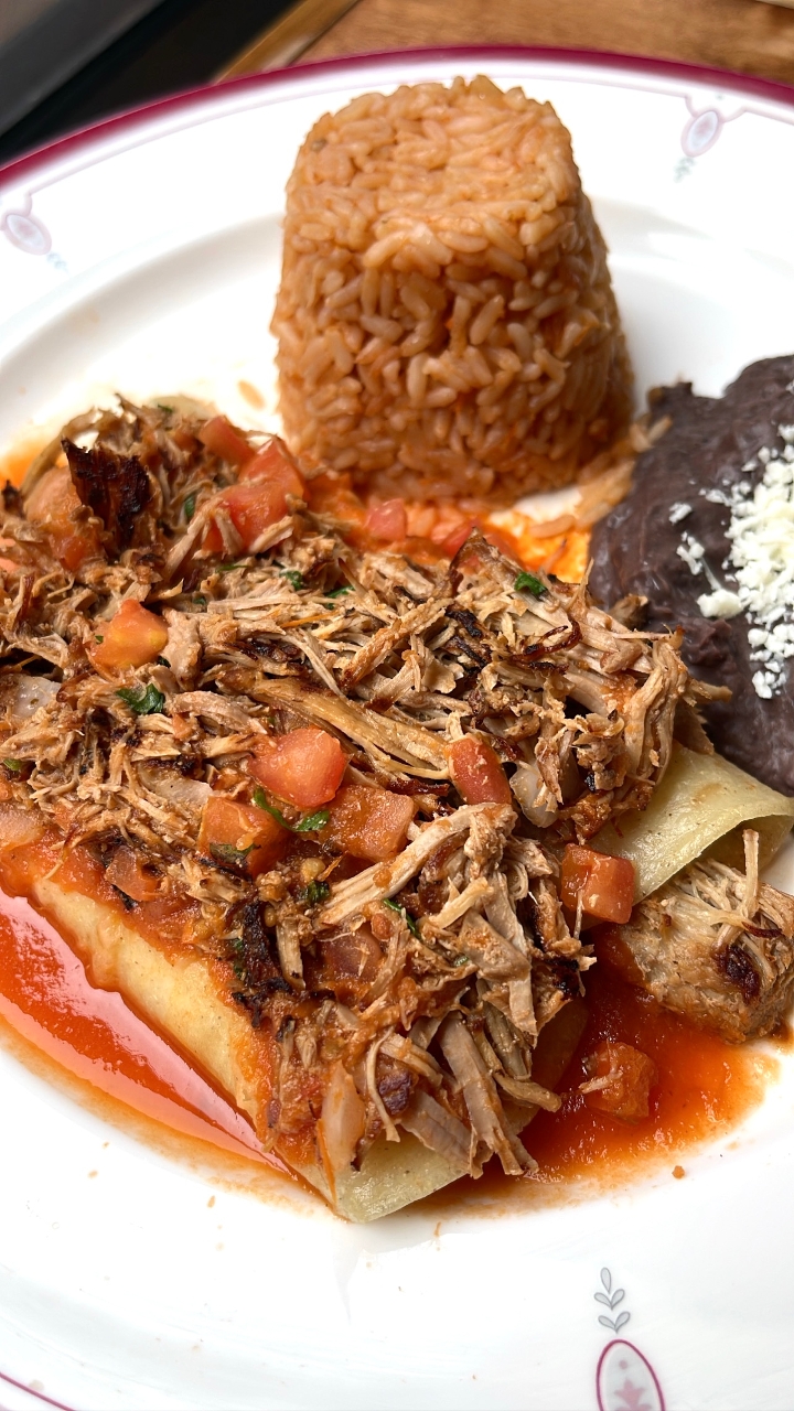 Carnitas  Enchiladas Rojas.