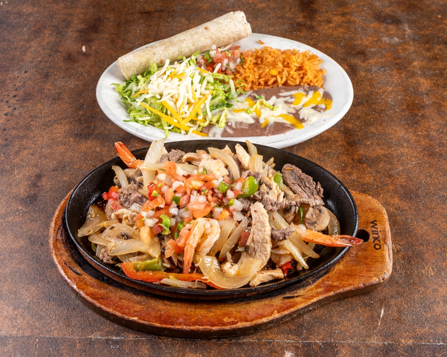Chicken, Steak And Shrimp Fajitas.