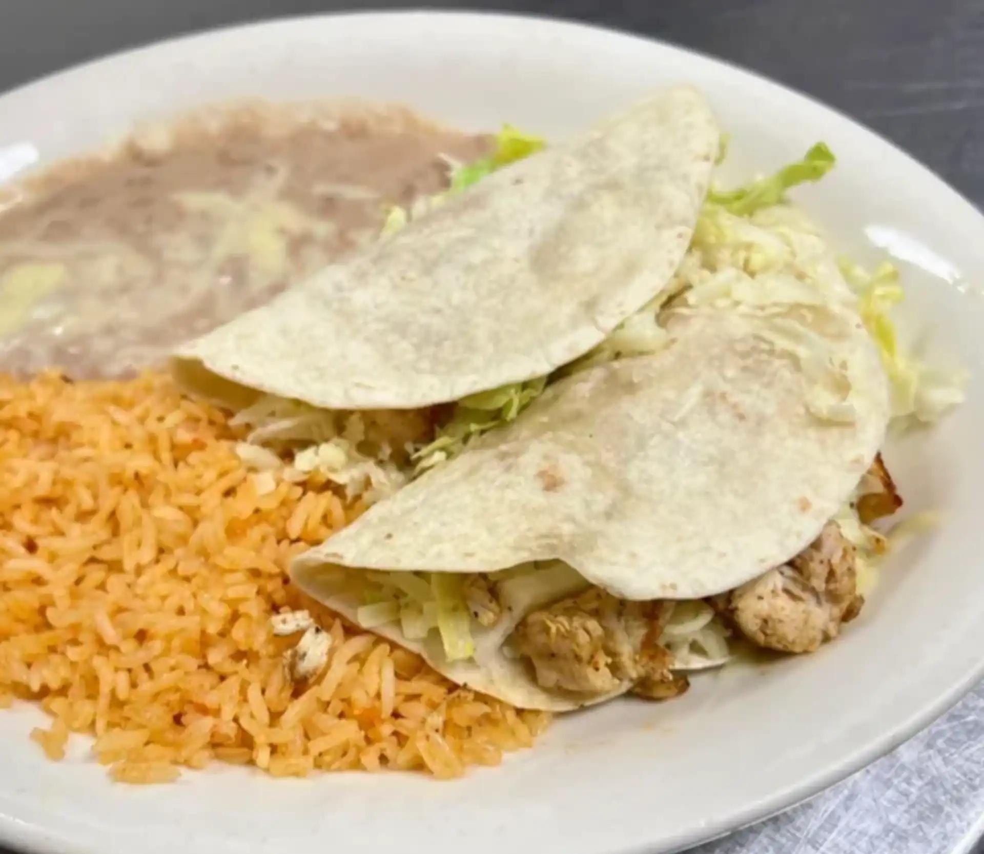 Two Tacos with Rice & Beans.