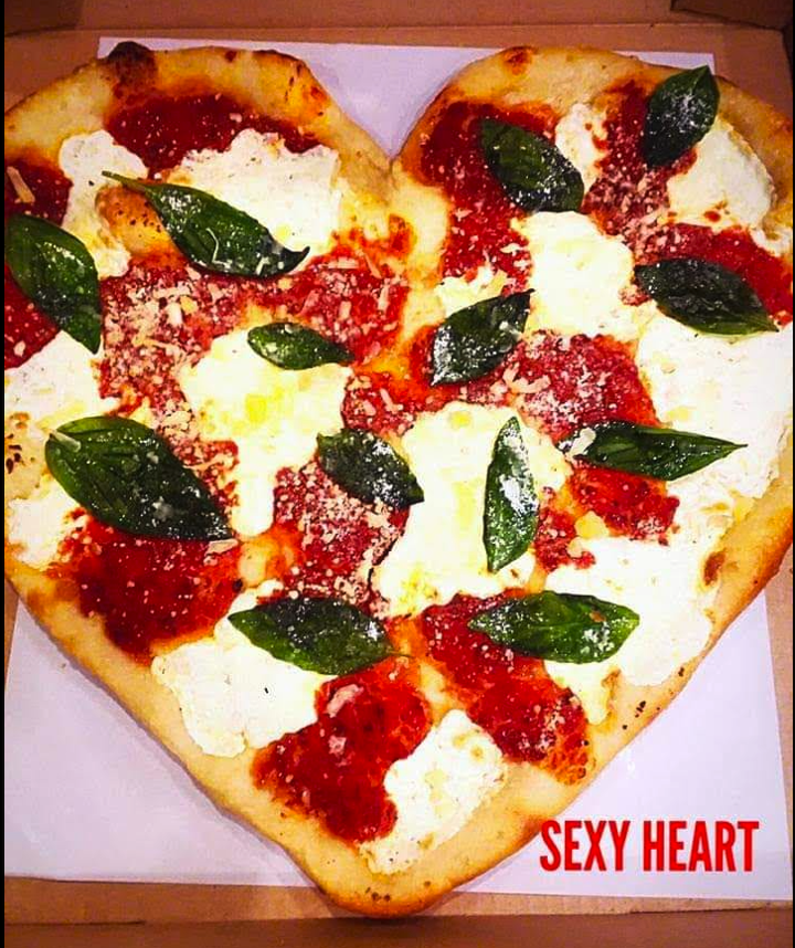 LARGE SEXY HEART PIZZA.