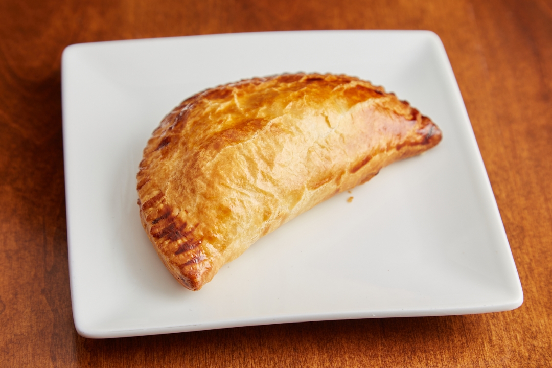 Chicken Fricasé Empanada.
