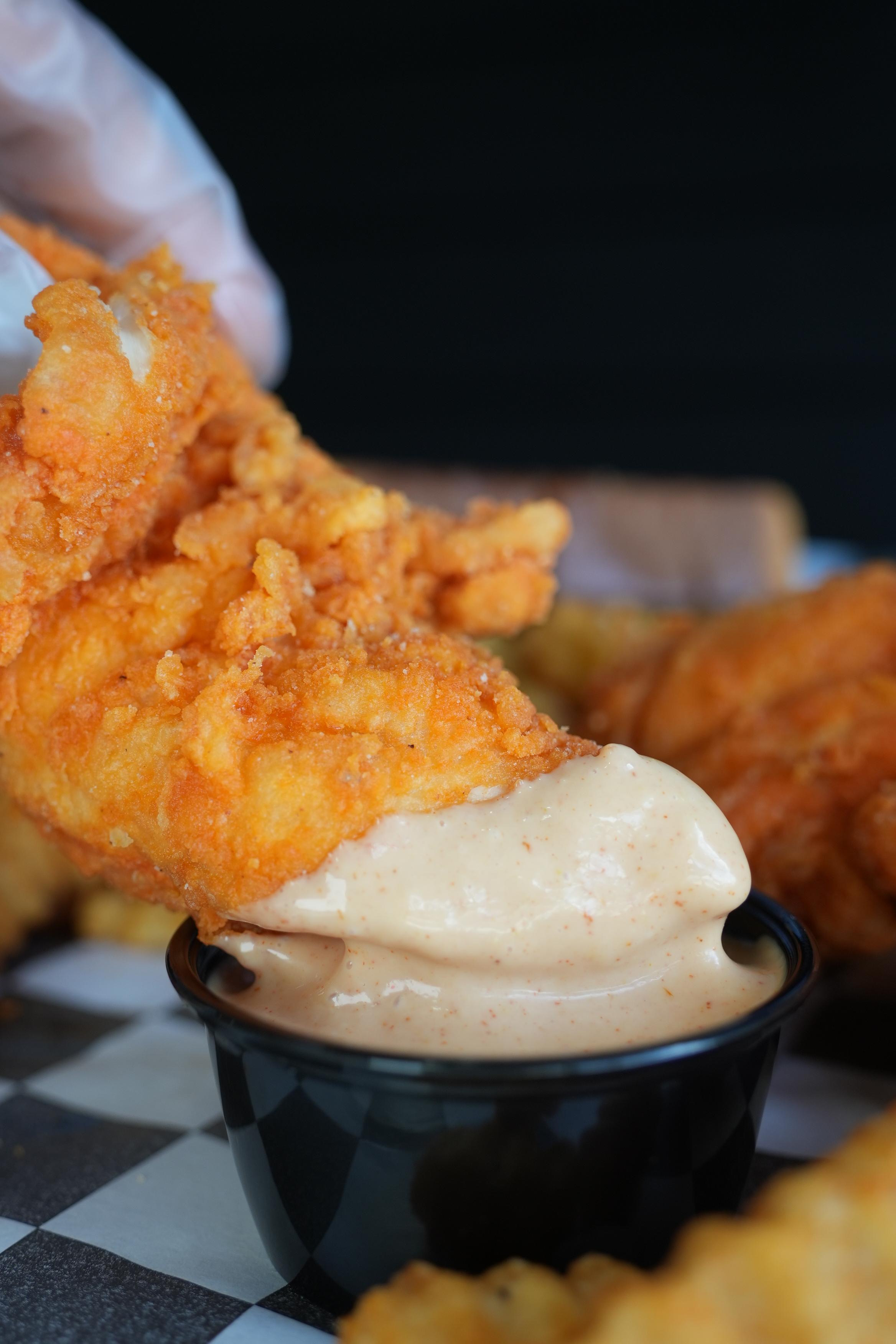 Single Hot Chicken Strip.