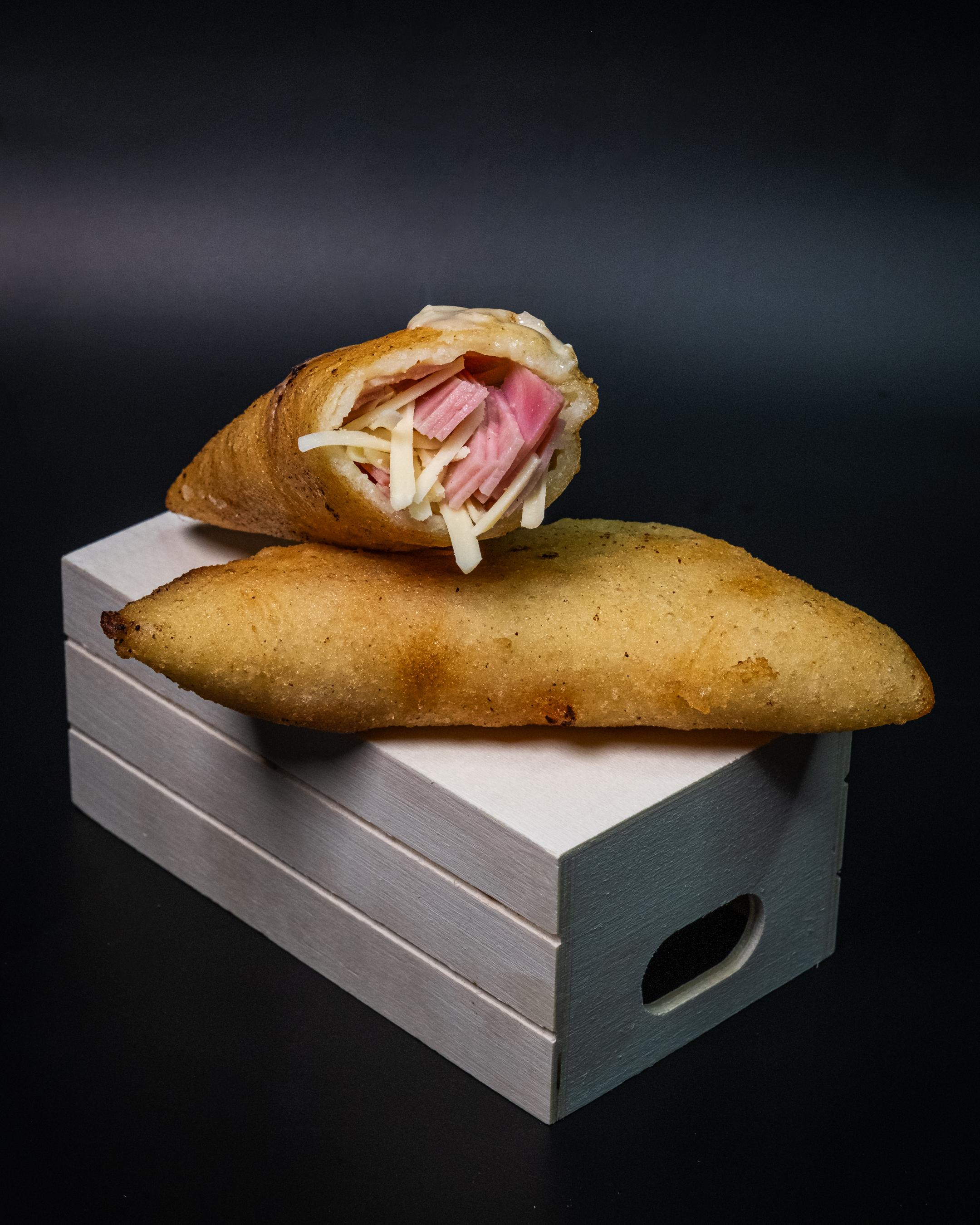 Ham & Cheese empanada.