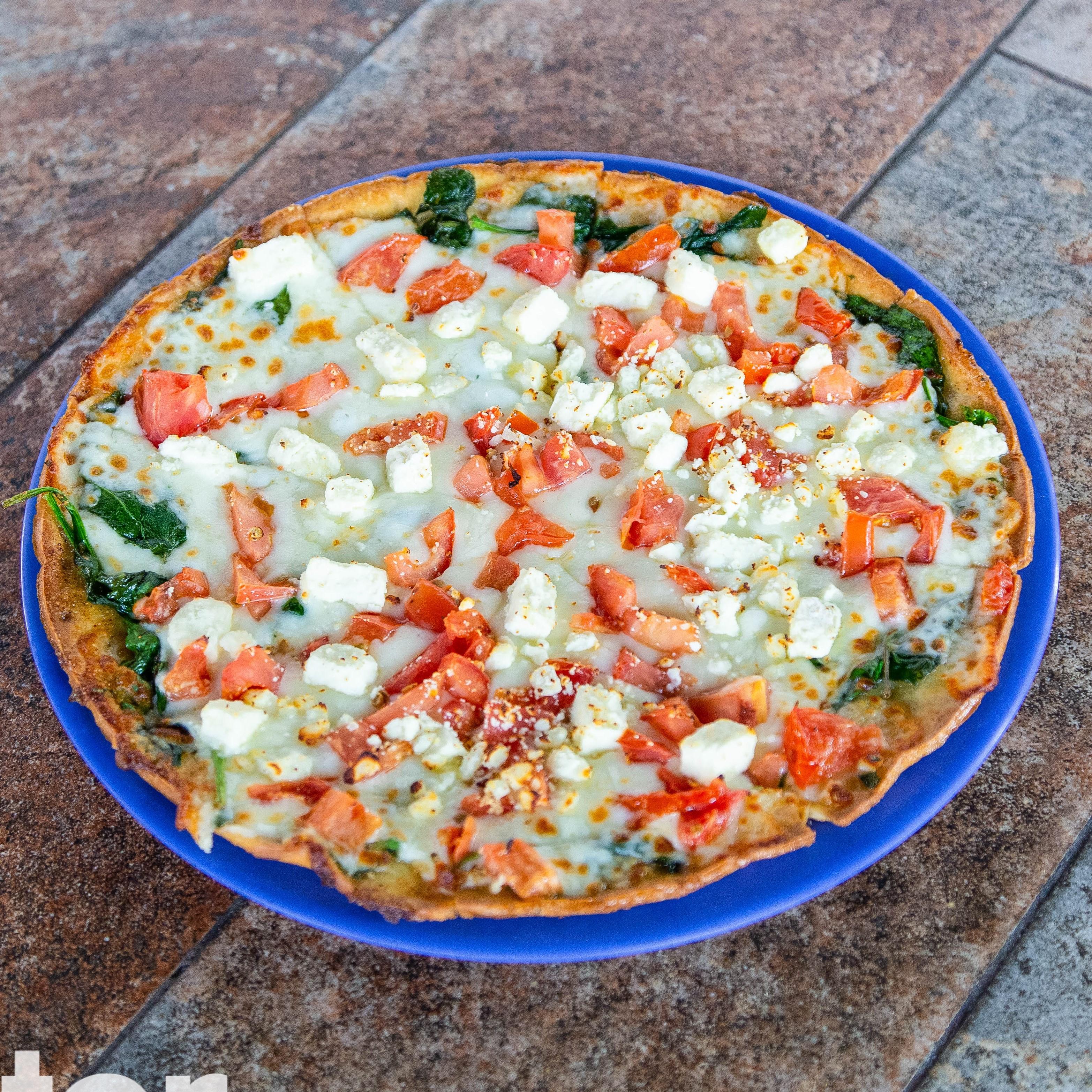 GF MEDITERREAN CAULIFLOWER PIZZA.