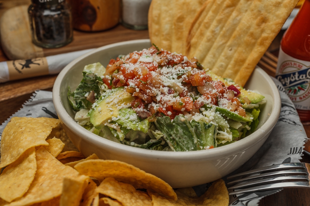 Tijuana Caesar Romaine.