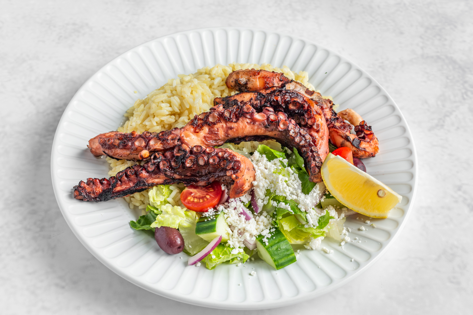 Grilled octopus dinner