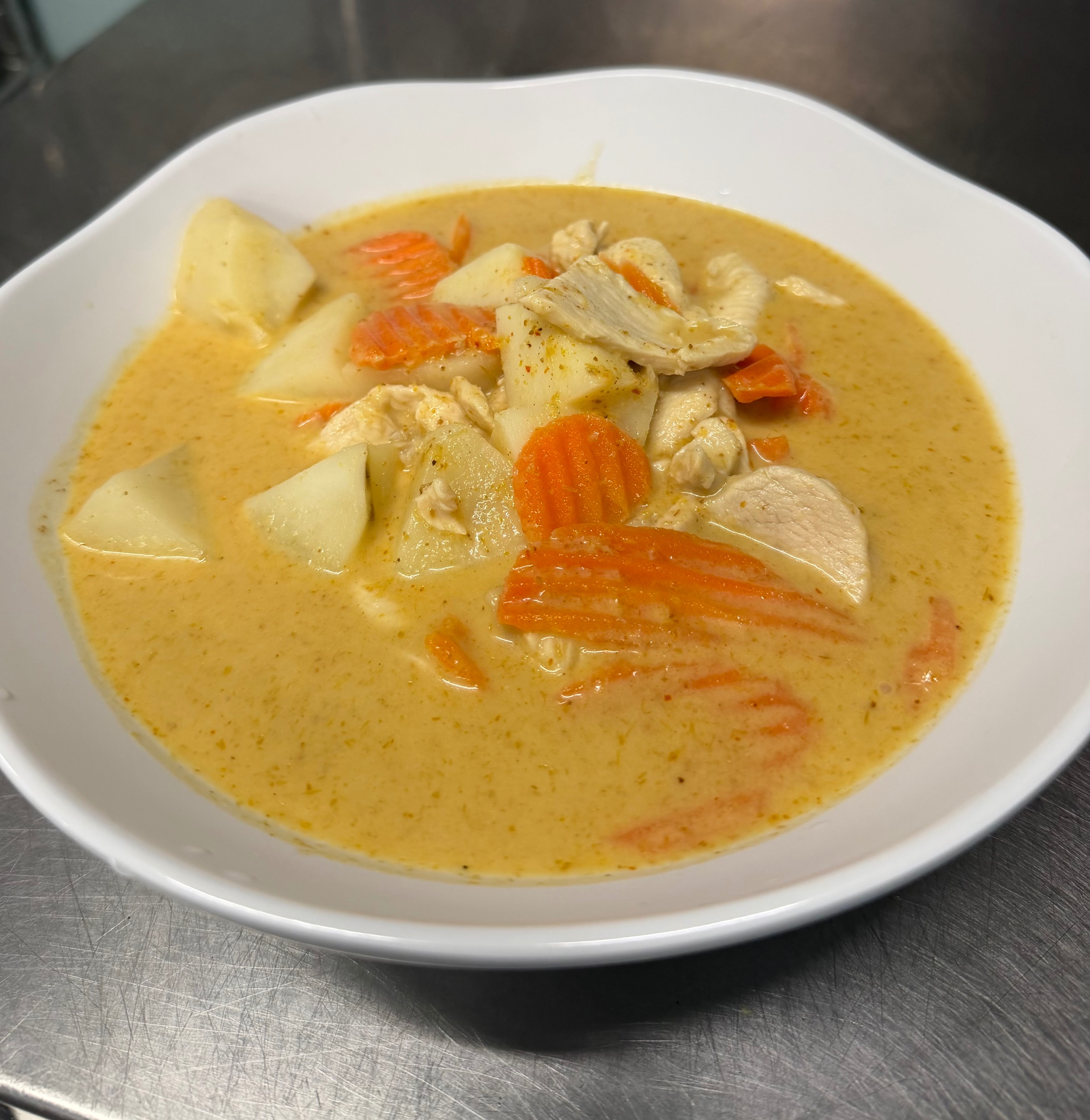Yellow Curry Chicken Served with Jasmine Rice.
