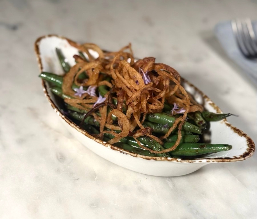 Blistered Green Beans, Masa's Spicy Sauce & Wispy Onions.