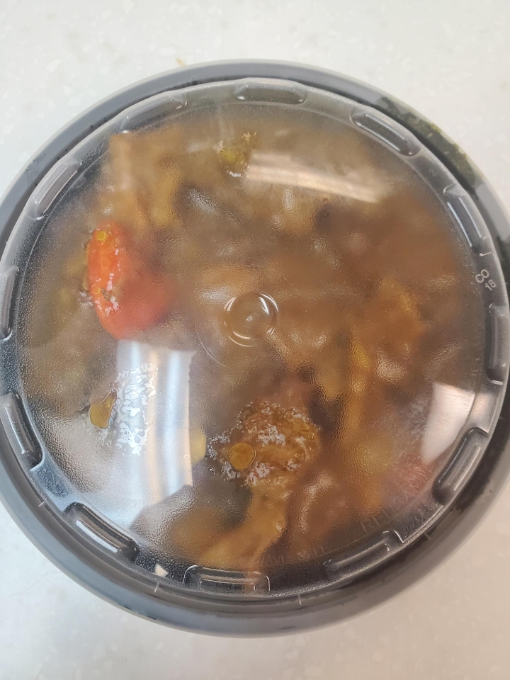 Side Order Curry Goat (16 oz).