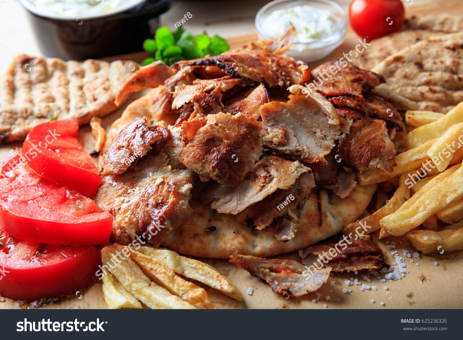 TRADITIONAL GREEK  GYRO (MEAT ONLY) 3 TO 5 PERSONS(.