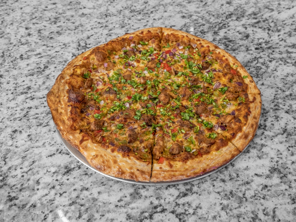 XL BUTTER CHICKEN PIZZA.