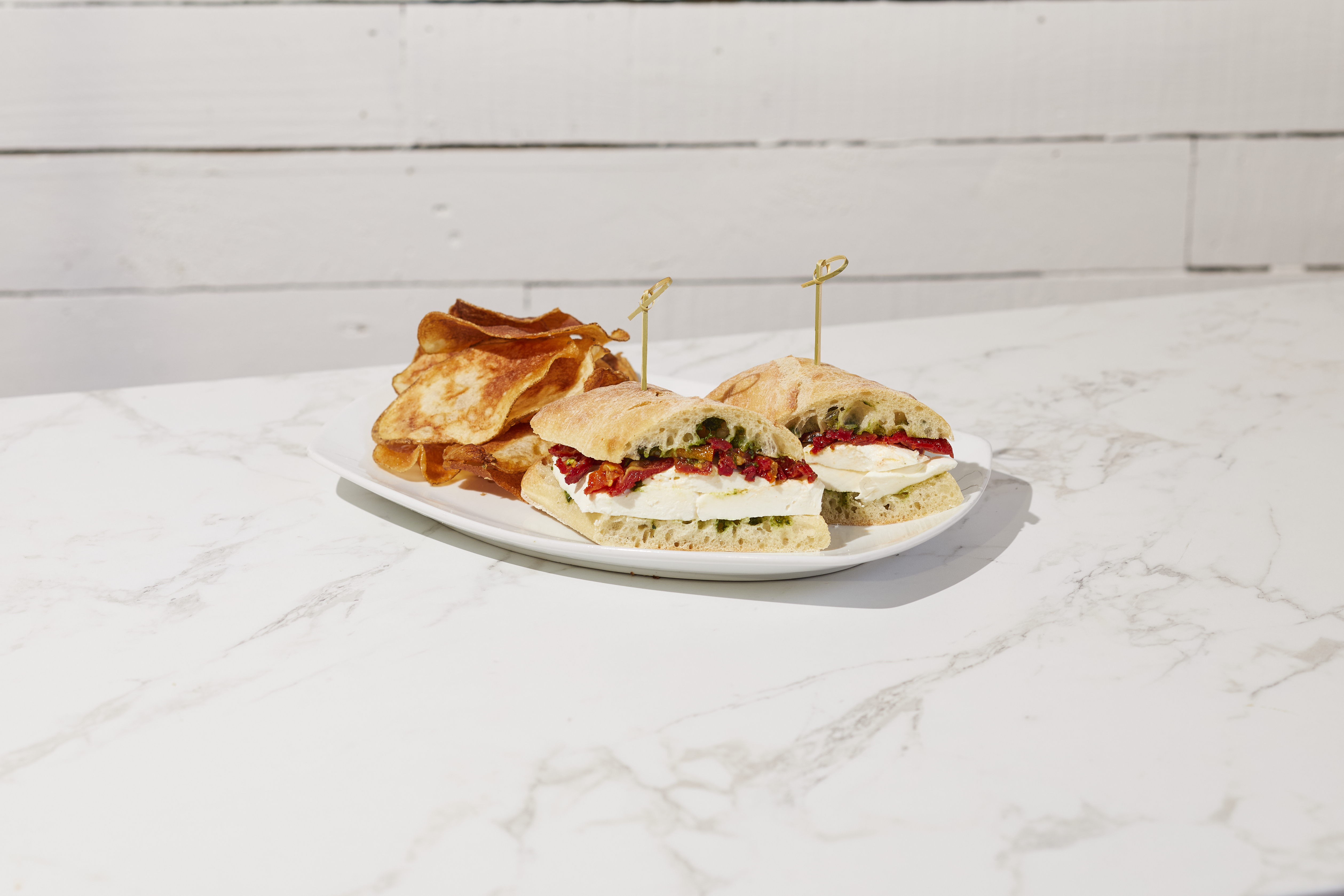 Fresh Mozzarella & House Dried Tomatoes.