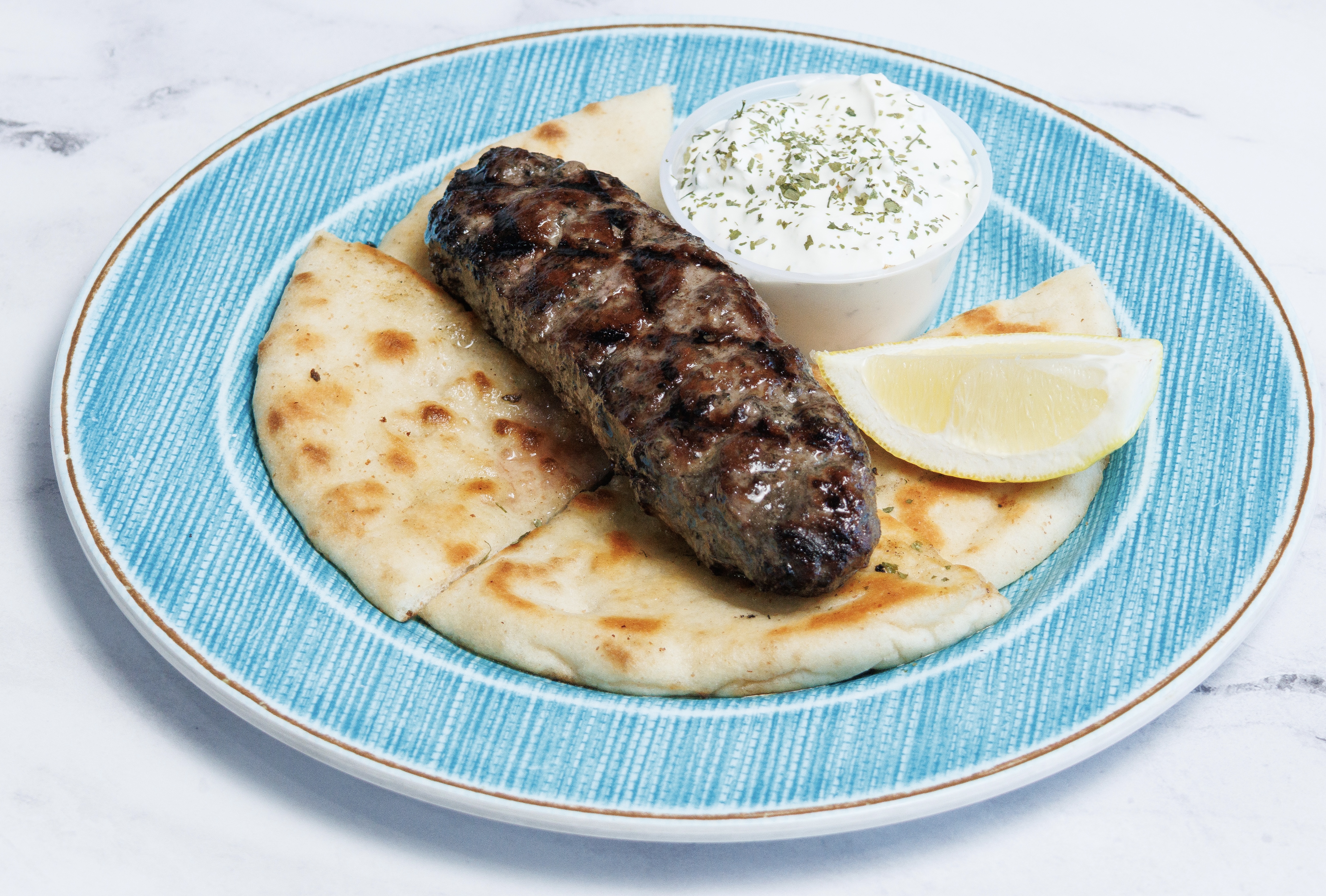 (1) BEEF & LAMB KABAB OLD FASHION W/ PITA & TZATZIKI.