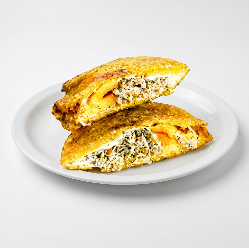 Arepa de Huevo con Carne Mechada.