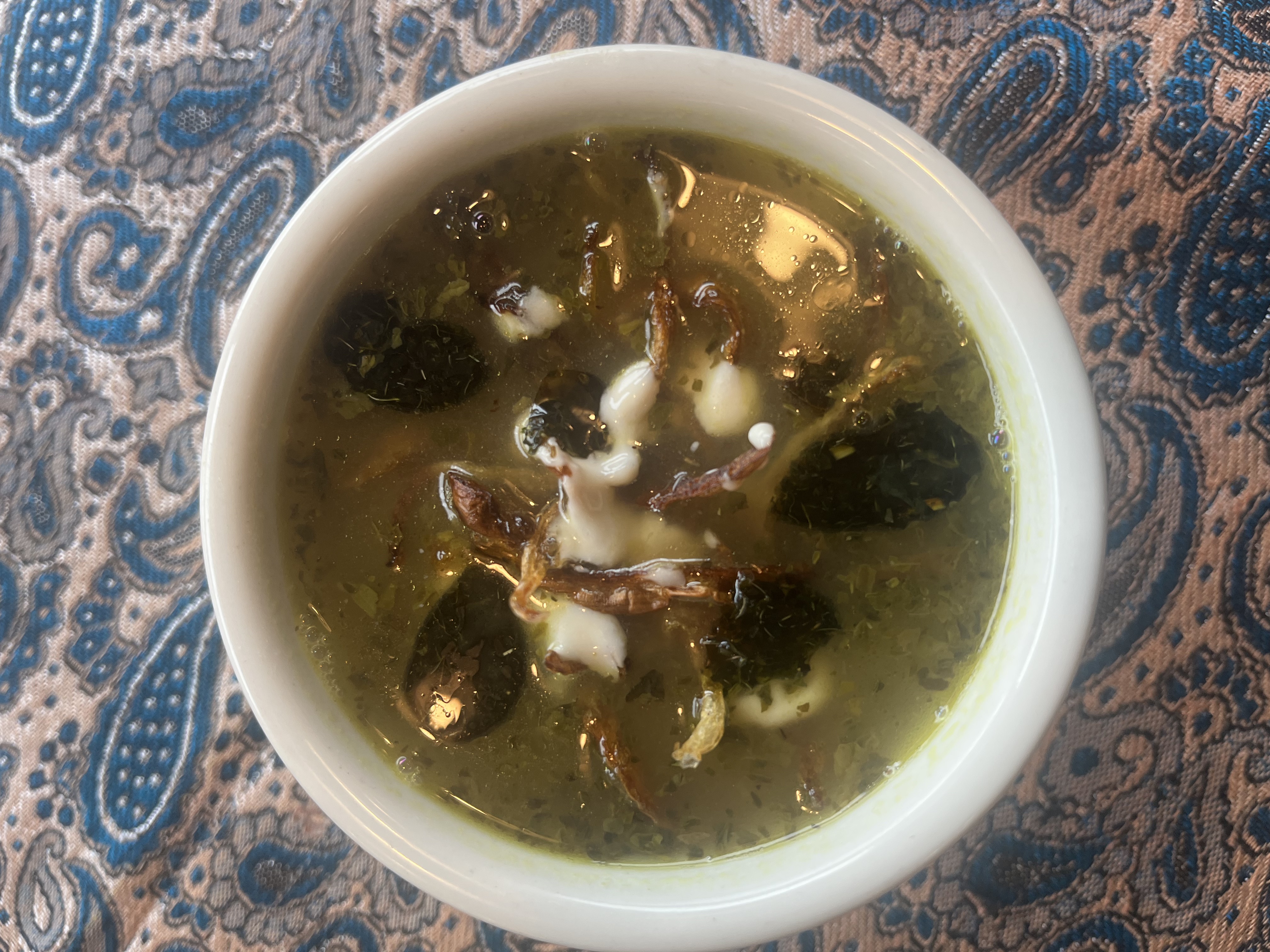 Ash Adas (Herb soup with lentil).
