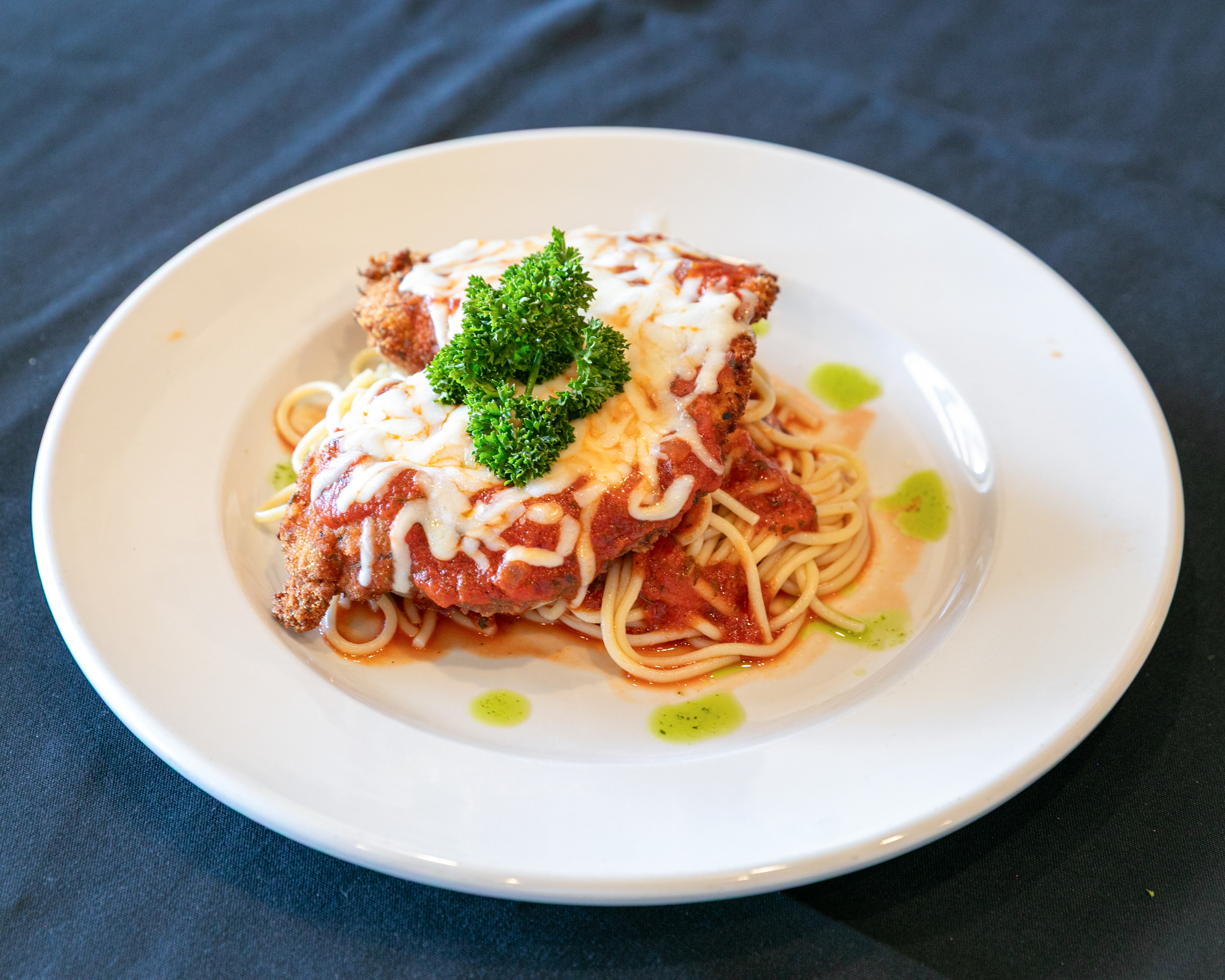 (L) Chicken Parmigiana.
