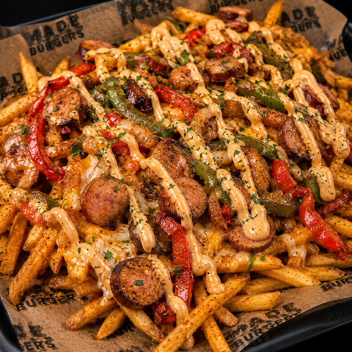 CAJUN CHICKEN SAUSAGE LOADED FRIES.