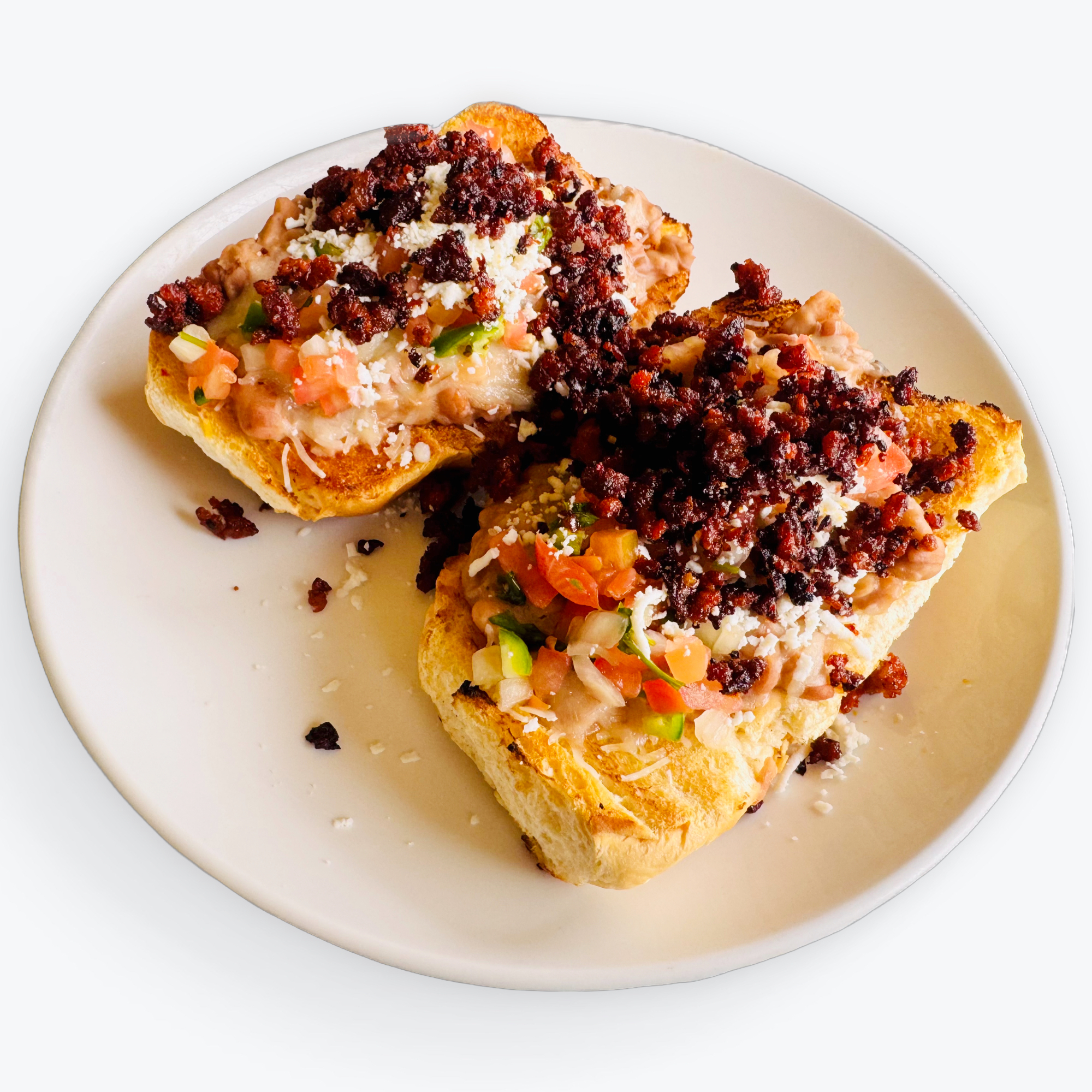 MOLLETES CON CHORIZO.