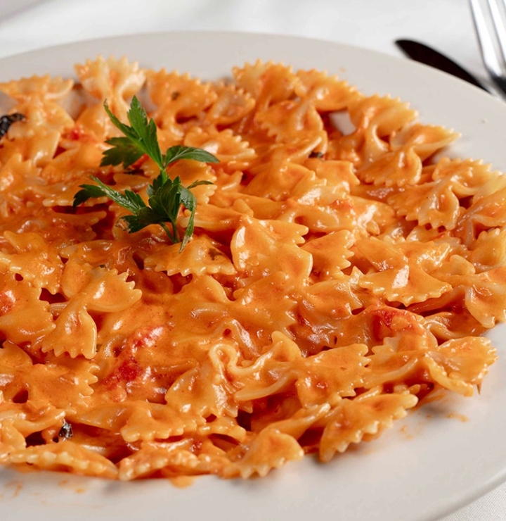 FARFALLA (BOW TIE PASTA) VODKA SAUCE.