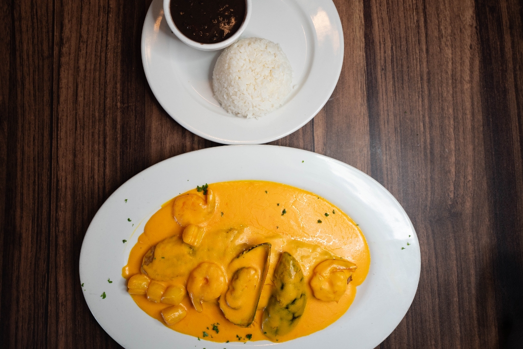 Fish Fillet in Seafood Sauce.