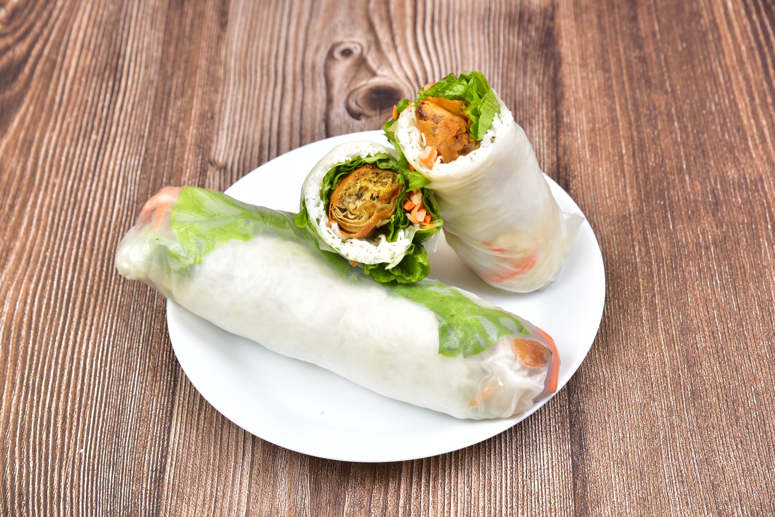 R6. Golden Nest Roll - Pork & Shrimp Egg Roll inside a Spring Roll.