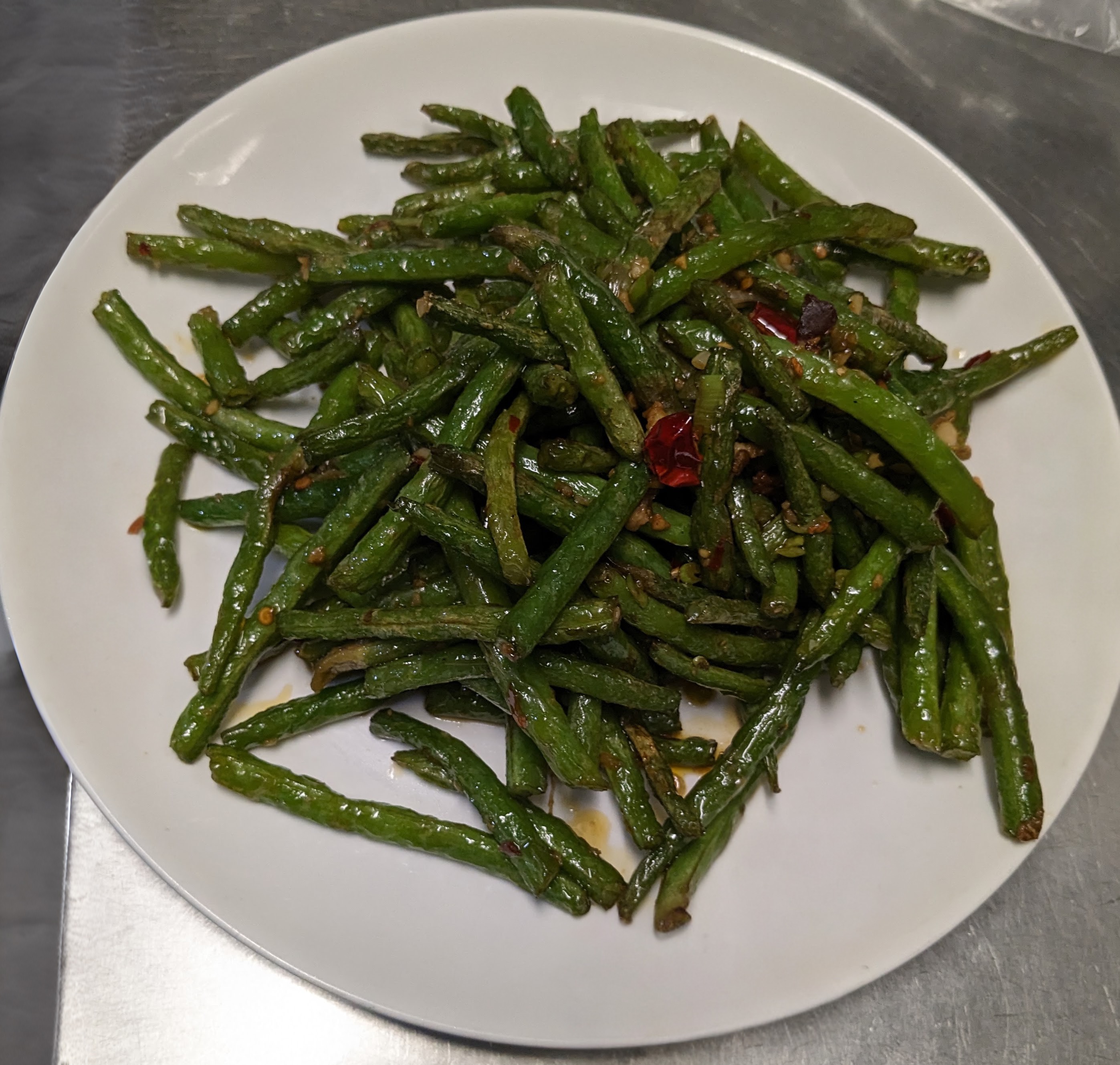 60 干煸四季豆SAUTEED STRING BEANS.