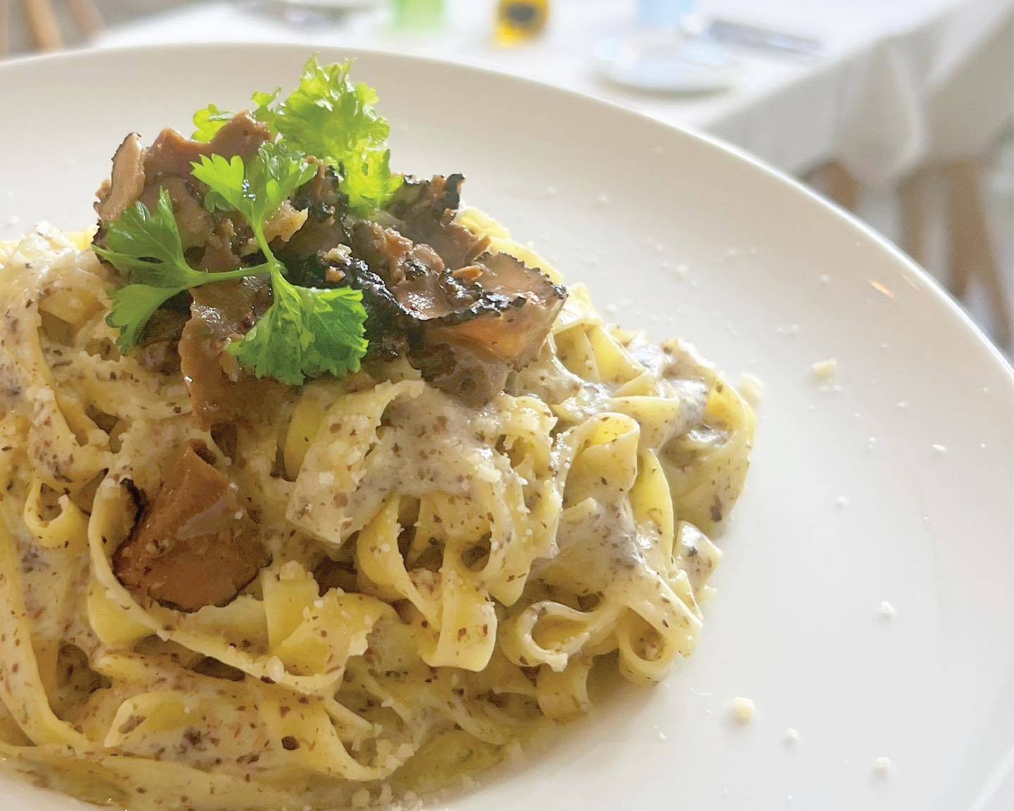 Vegan fettuccine black truffles.