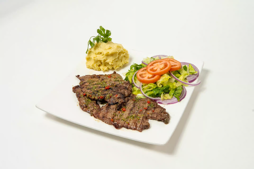 Churrasco with sides/ flank steak with a side.