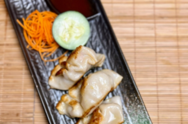 A.    Home made Gyoza Pork  (5 pcs).