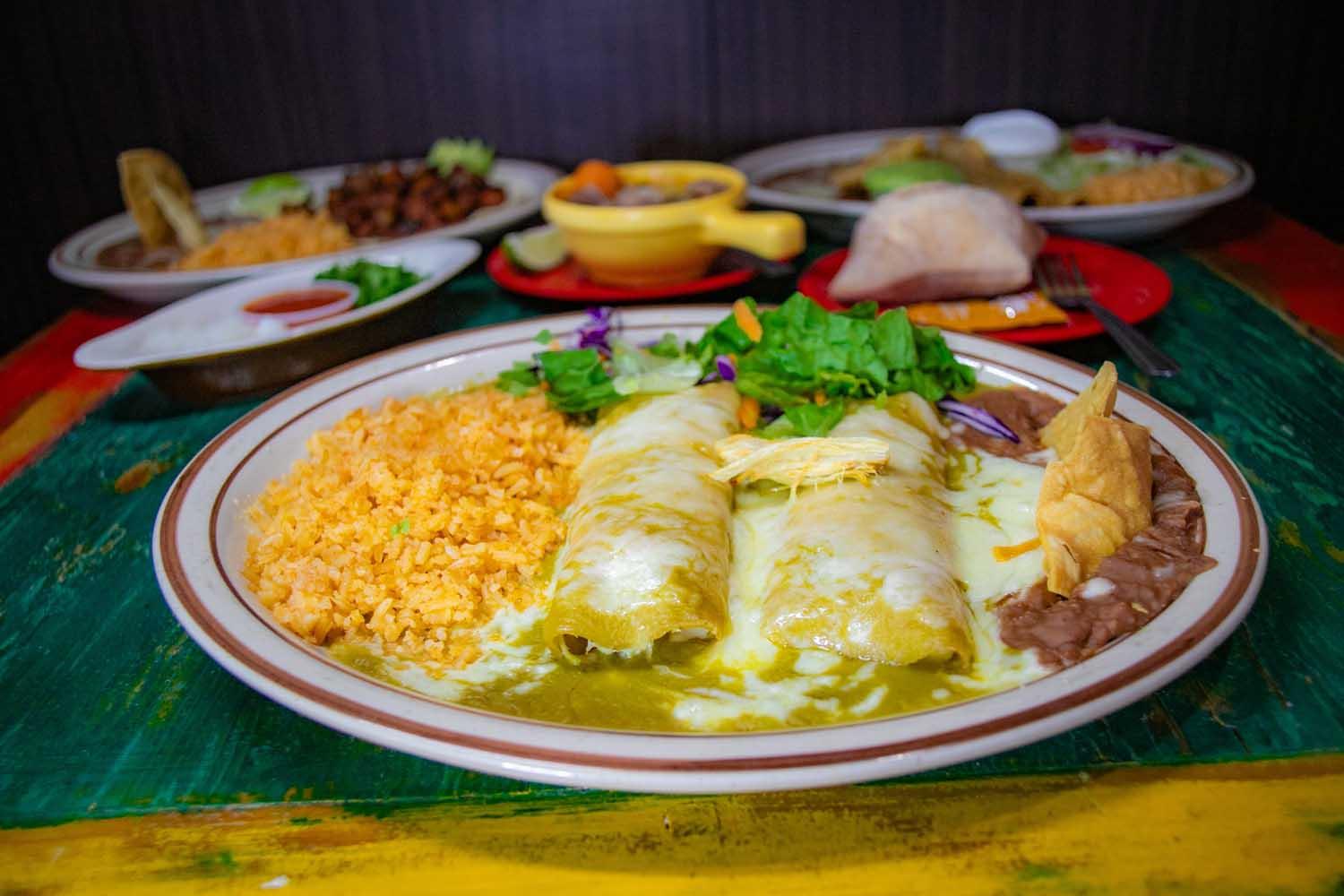 Tuesday Special/(3) Chicken Enchilada Plate.