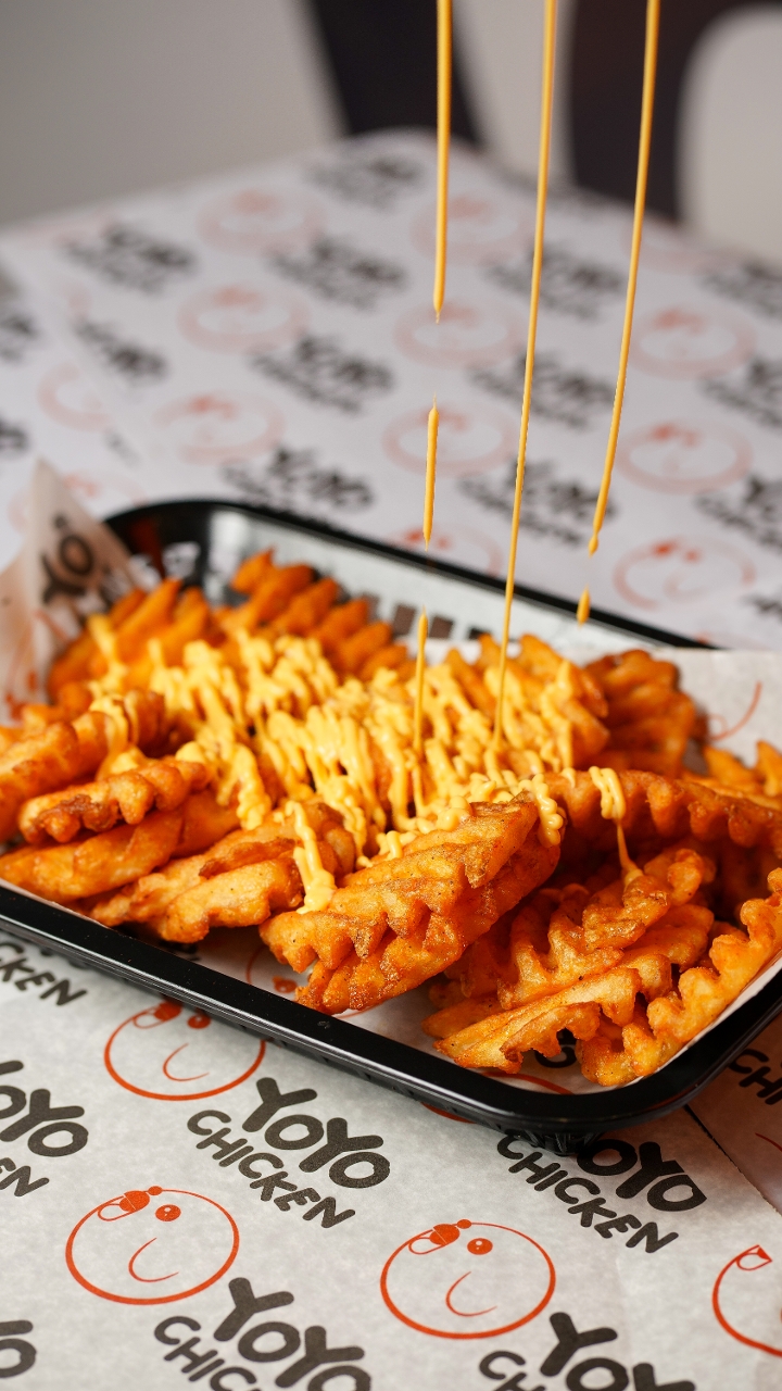 Waffle Fries with Cheese.